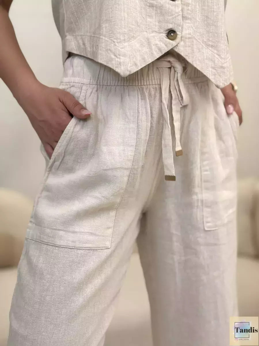 شلوار لینن کرم جلوبنددار